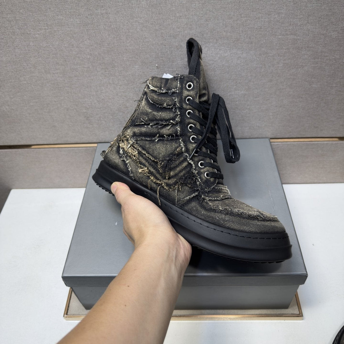 Charcoal Gray and Black High-Top Sneakers — model