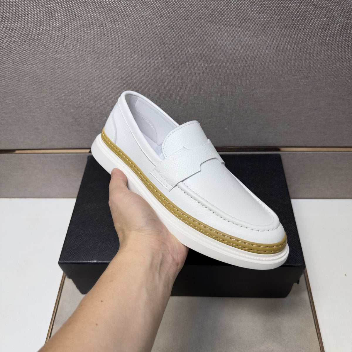 Prada Gold Accent Slip-On Loafers — model
