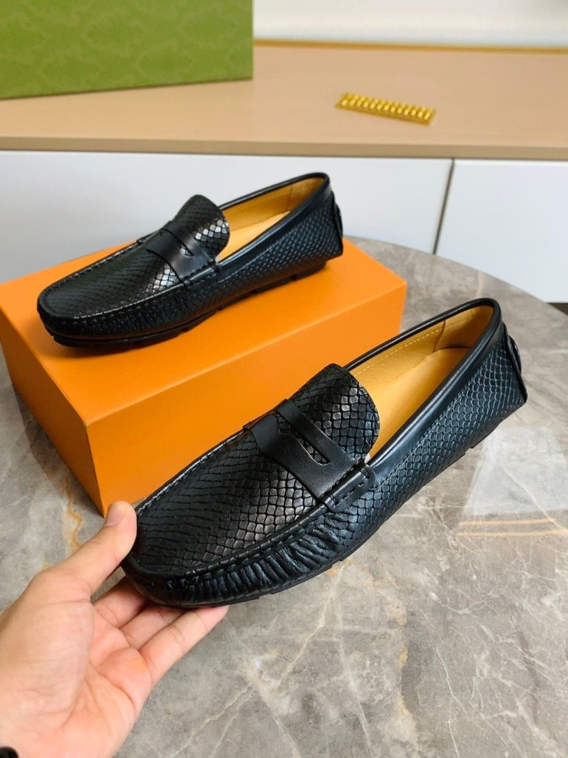 Louis Vuitton Textured Penny Loafers — side
