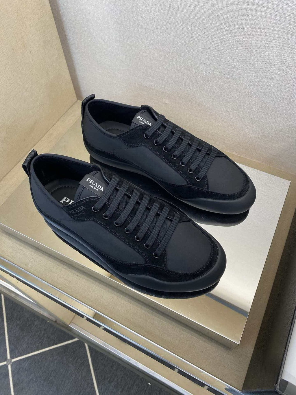 Prada Low-Top Leather Sneakers — model